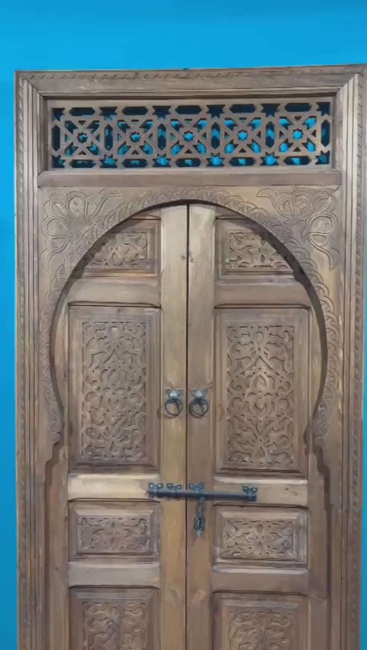 Fantastic Double Unique Door With Two carved panels , Royal Moroccan Handmade sculpture with a Moorish artwork .