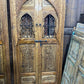 porte double avec fenêtre en fer forgé a la marocaine