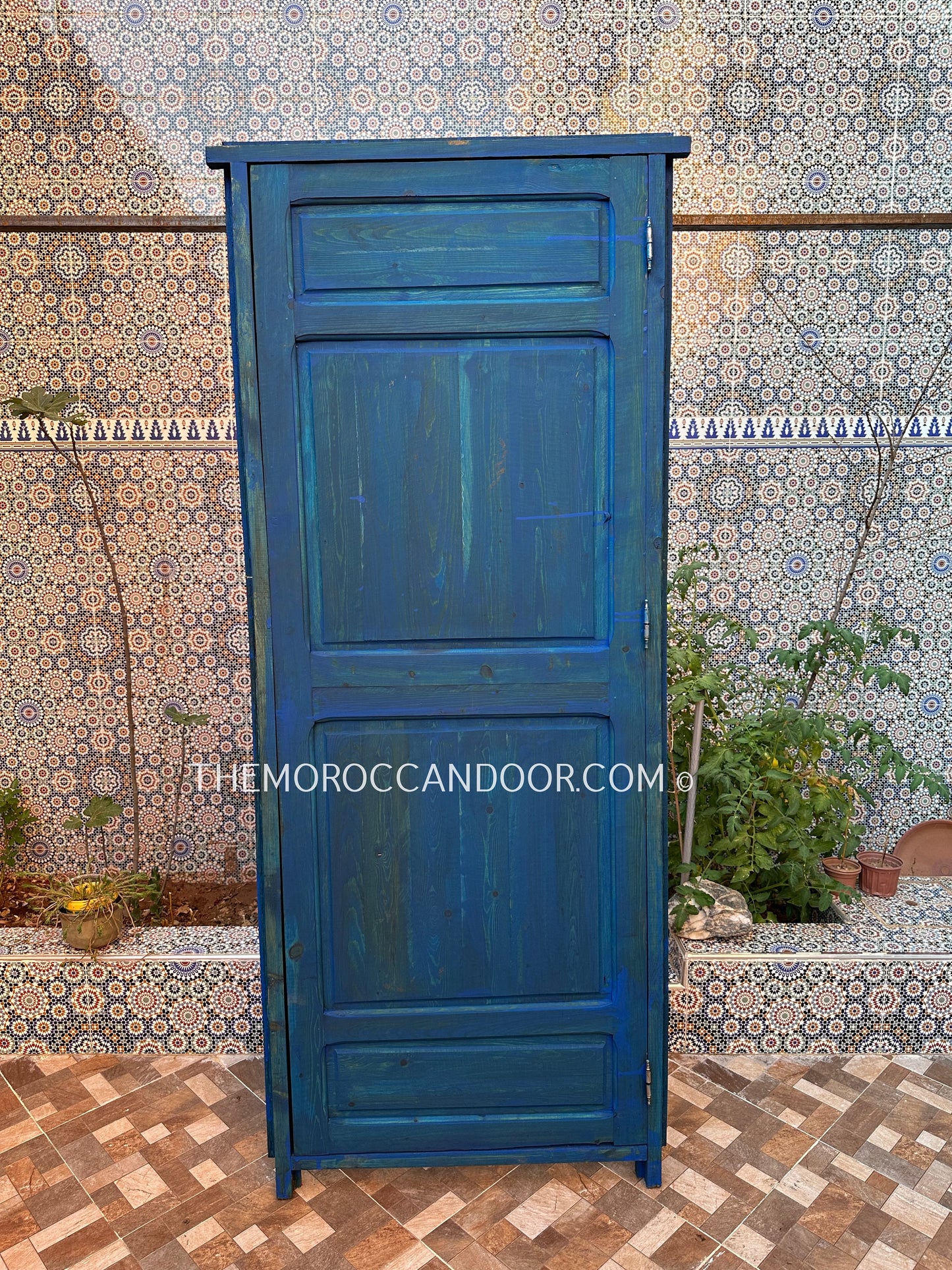 With This Custom Carved Moroccan Blue Door, you can bring the magic of Morocco into your home.