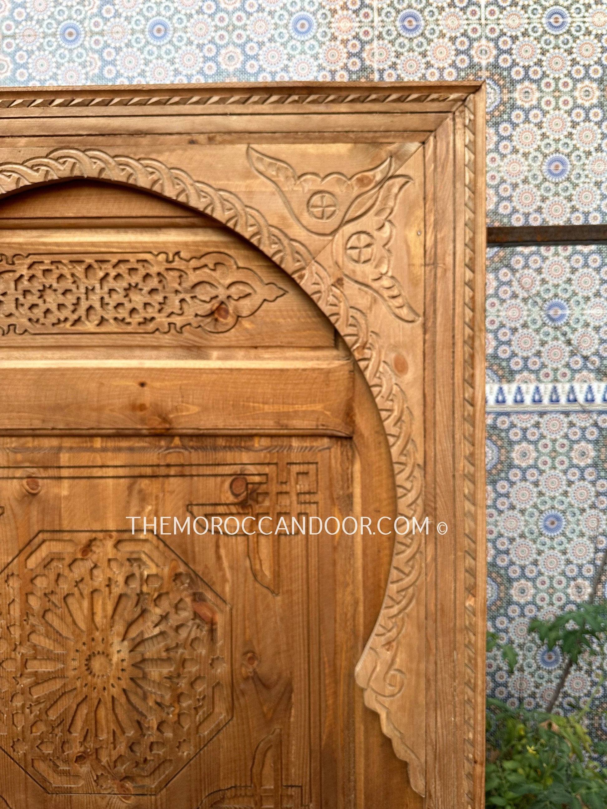 Solid wood Moroccan door adorned with intricate designs