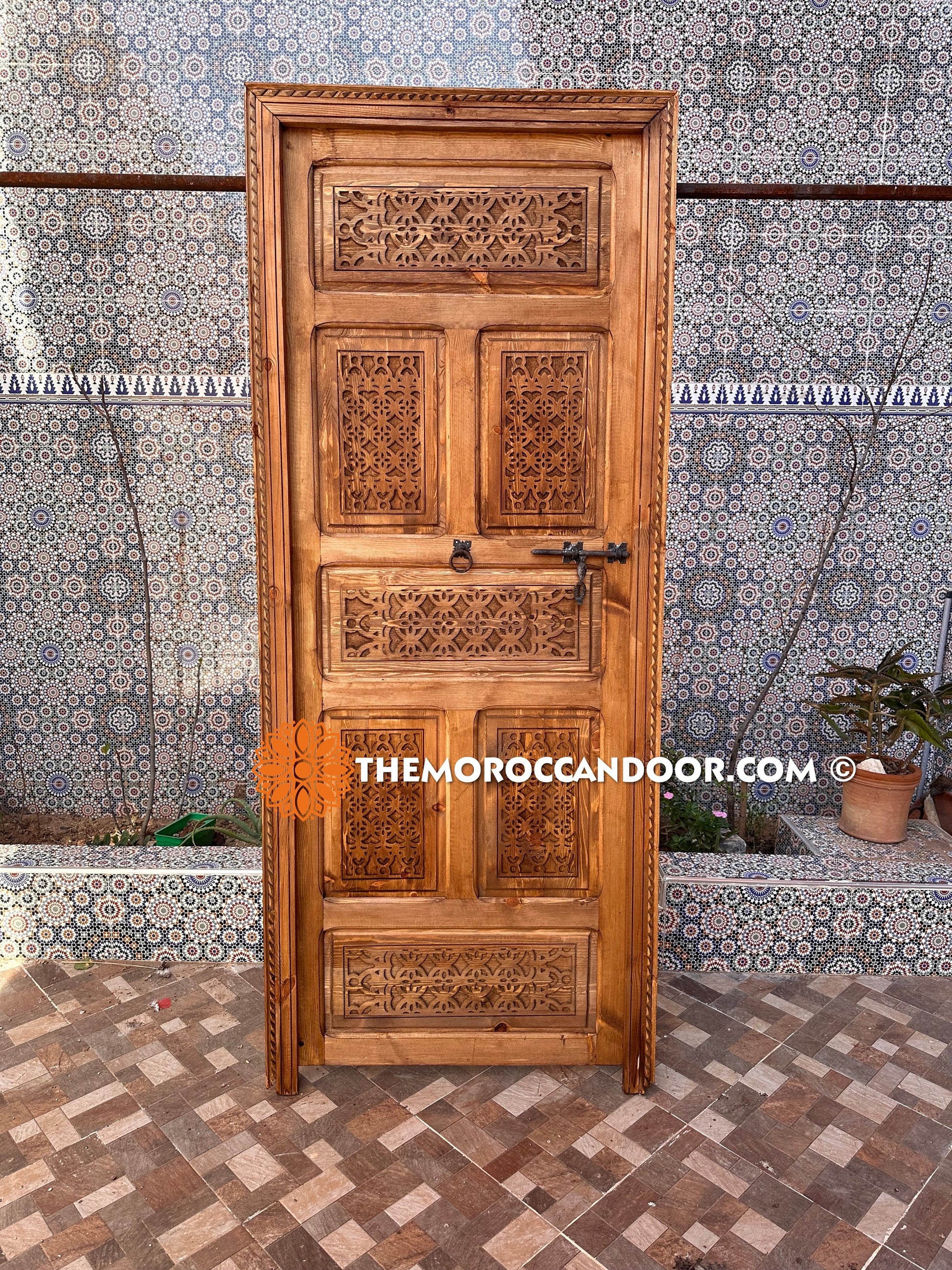 With a custom hand-carved door